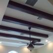 Stained beams in dining room